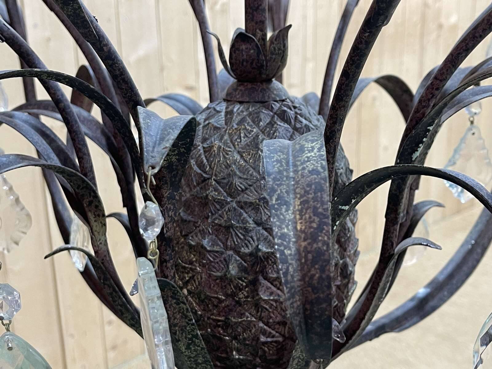 Large pineapple chandelier in blackened metal and tassels
