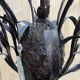 Large pineapple chandelier in blackened metal and tassels