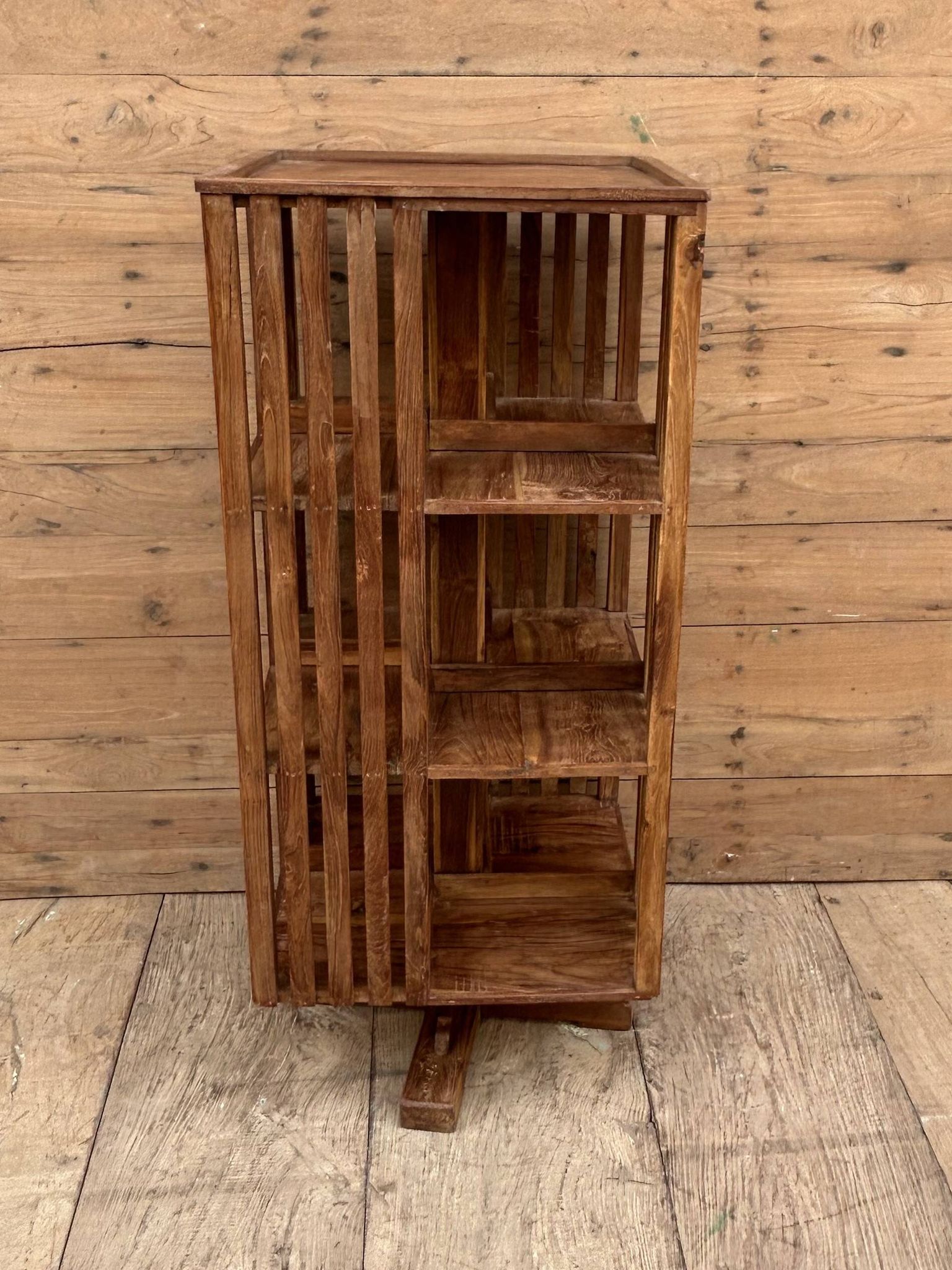 rotating library in Burmese teak