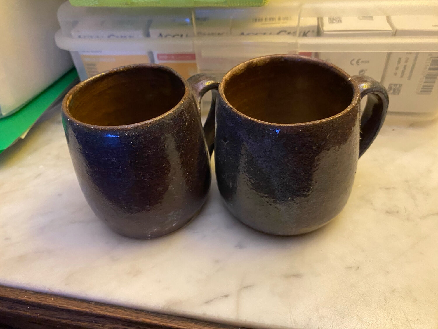 Sets of signed glazed stoneware mugs