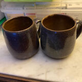 Sets of signed glazed stoneware mugs
