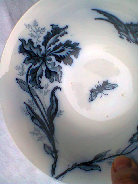 Ramekin in earthenware with decoration of flowers, butterflies and birds