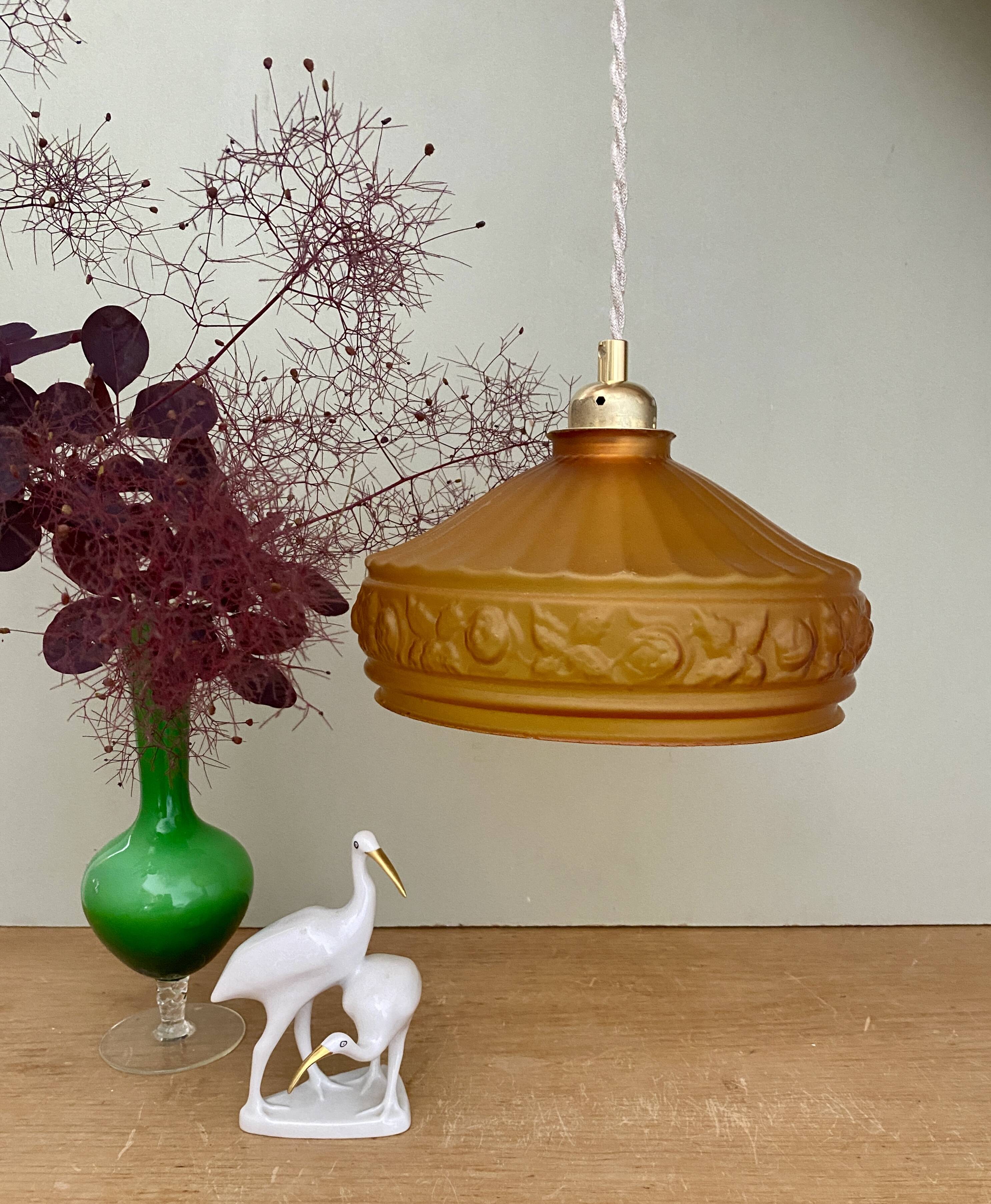 Pendant light with old art deco lampshade in yellow glass