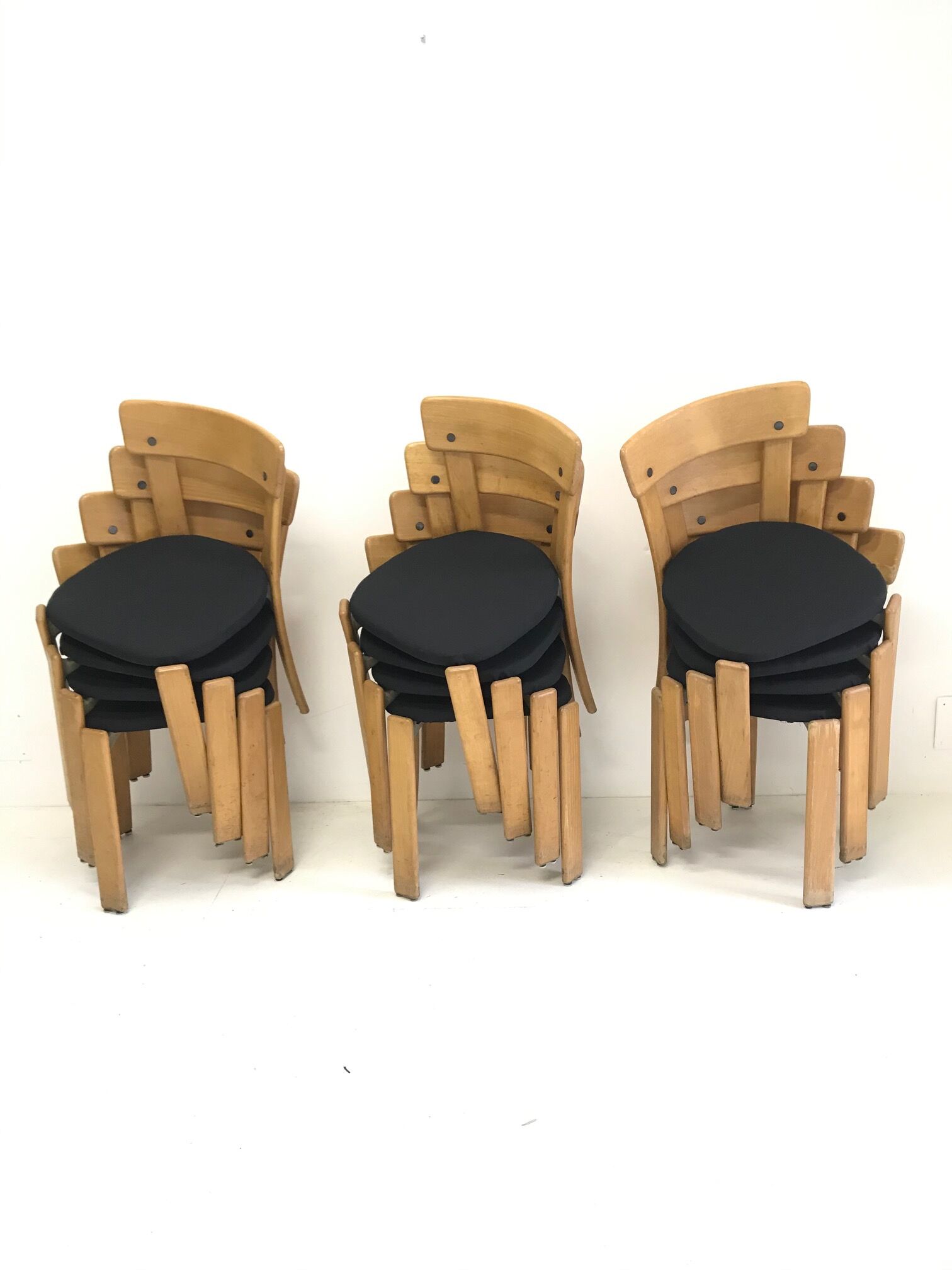 Designer Bruno Rey's suite of 12 chairs