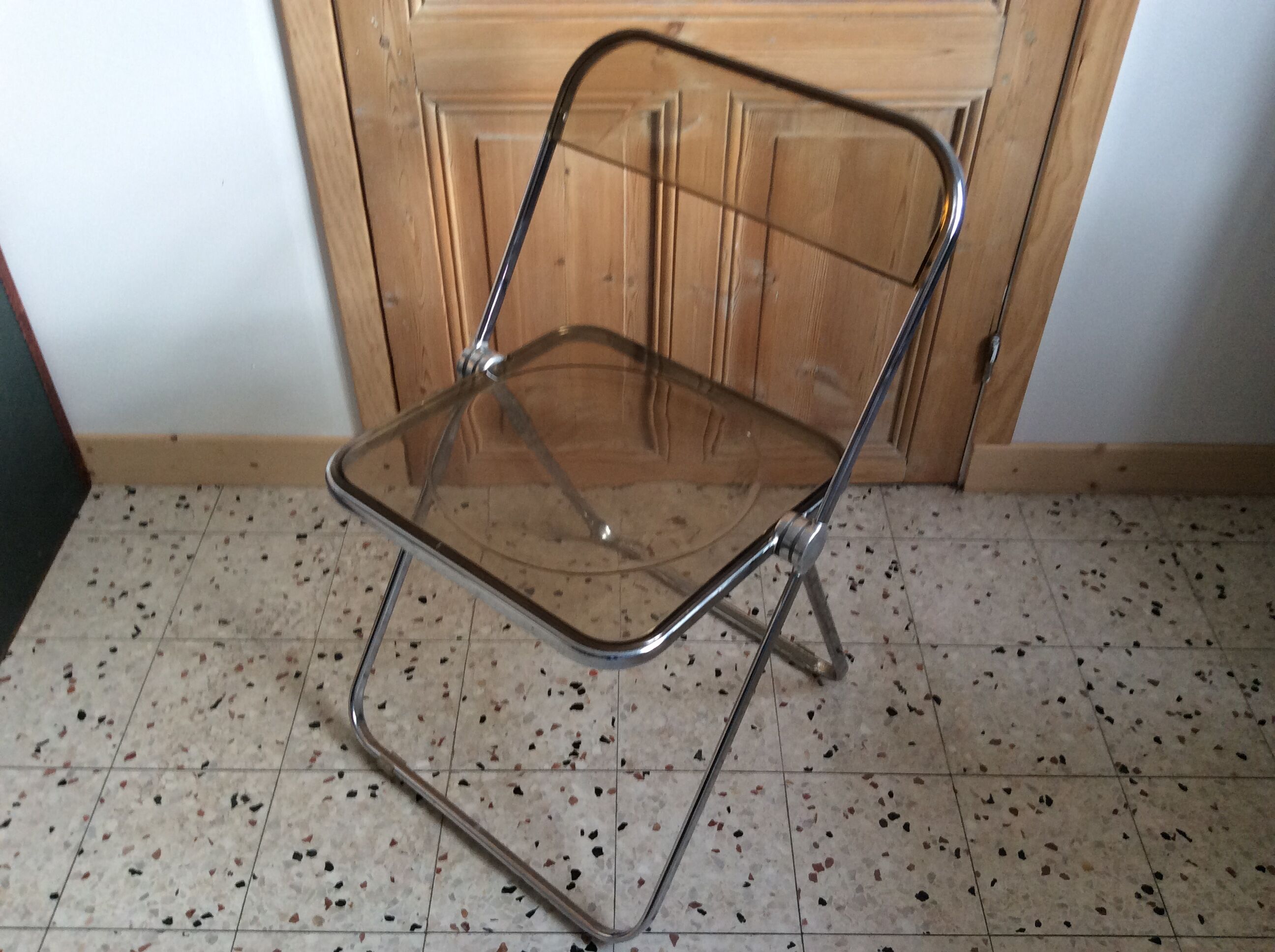 Folded chair by Giancardo Piretti for Castelli