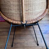 Rattan satellite armchair from the 1950s
