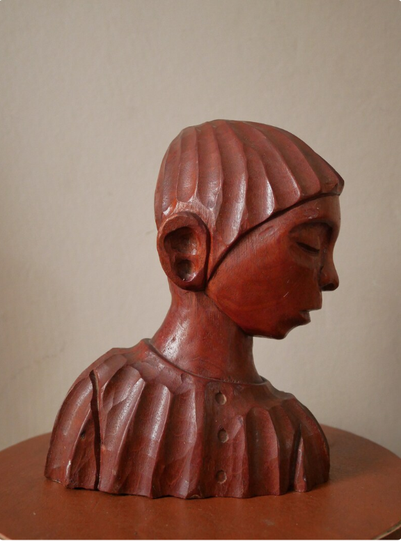 Carved wooden bust