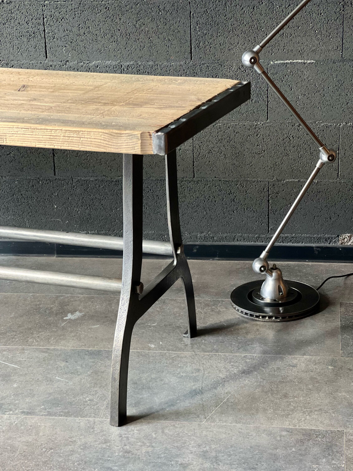Industrial table with cast iron legs