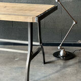 Industrial table with cast iron legs