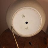 Ceramic lamp with rattan lampshade.
