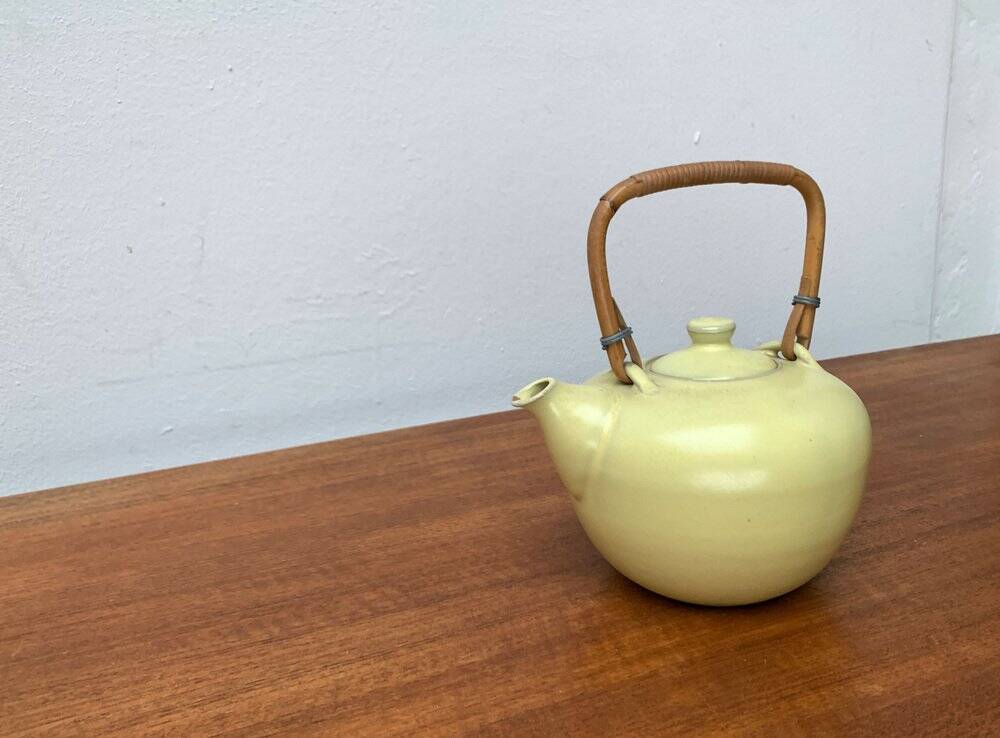 Mid-century ceramic teapot with bamboo handle, 1960s.