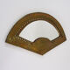 Old wall mirror in the shape of a copper fan pushed back, year 70