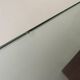 Mid-century minimalist thick glass coffee table, rosewood legs, 1960, Germany.