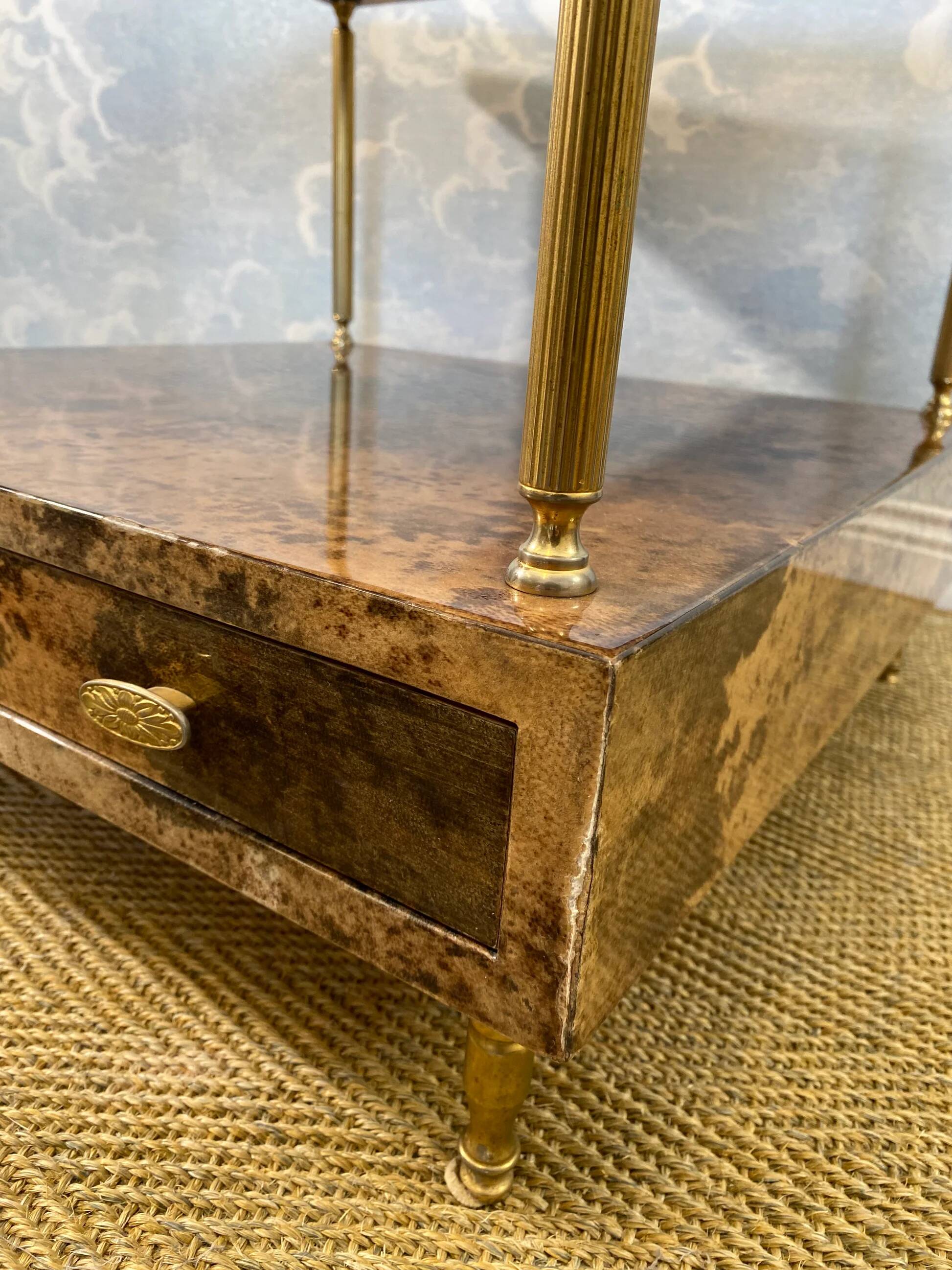 Aldo Tura side table in hazel brown tones with brass legs and bottom drawer