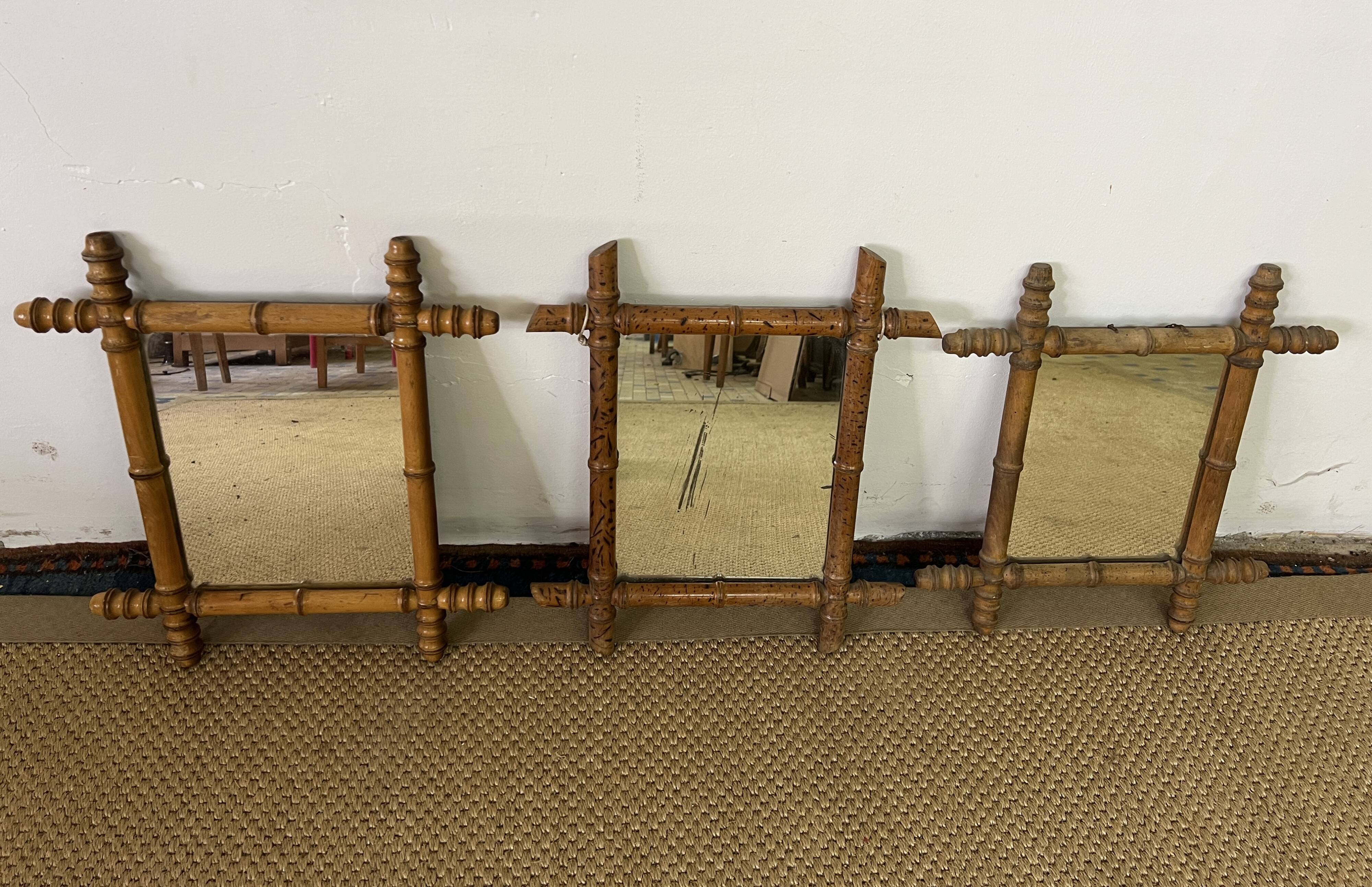 Suite of three antique mirrors in bamboo and rattan