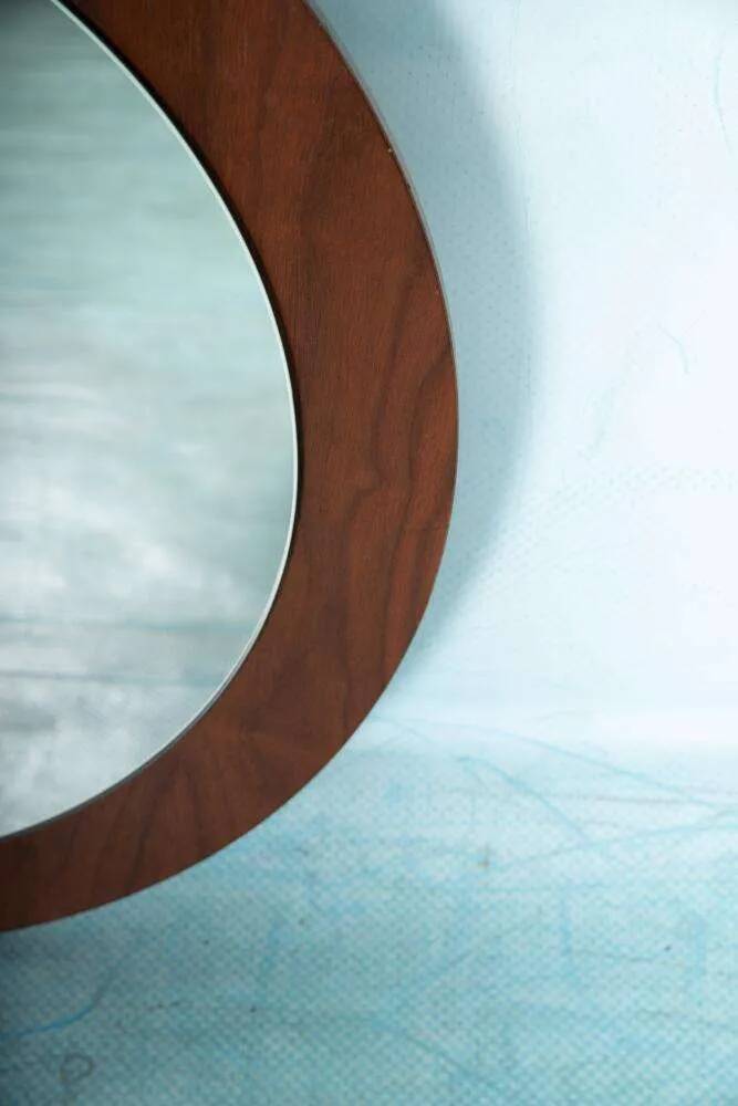 Vintage walnut wall mirror, minimalist from the 1960s.