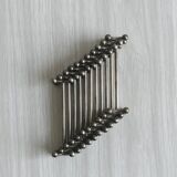 Ensemble de 11 porte-couteaux en métal.