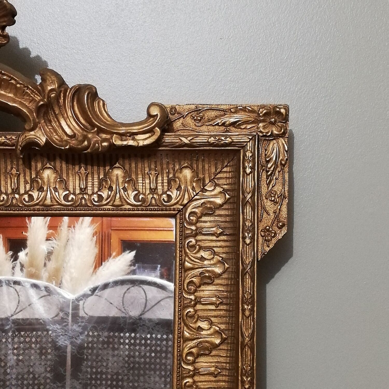 Mirror with pediment rocaille in gilded wood and stucco Louis XV style
