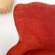 Red velvet toad armchair with fringes