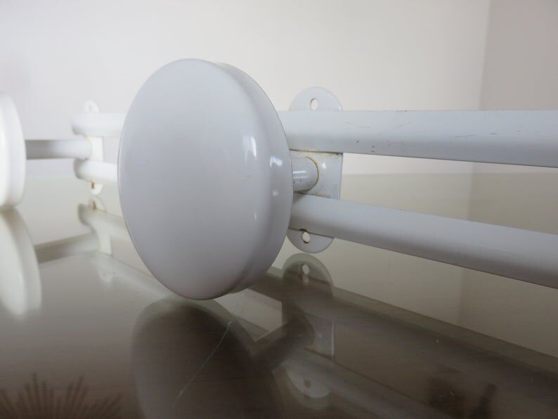 White metal coat holder in 70s