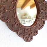 Miroir en bois sculpté et daté 1924