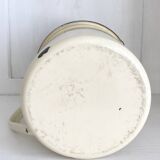 Old milk jug in enameled sheet metal