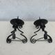 Pair of iron candlesticks