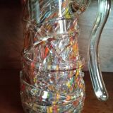 Multi-colored speckled glass pitcher