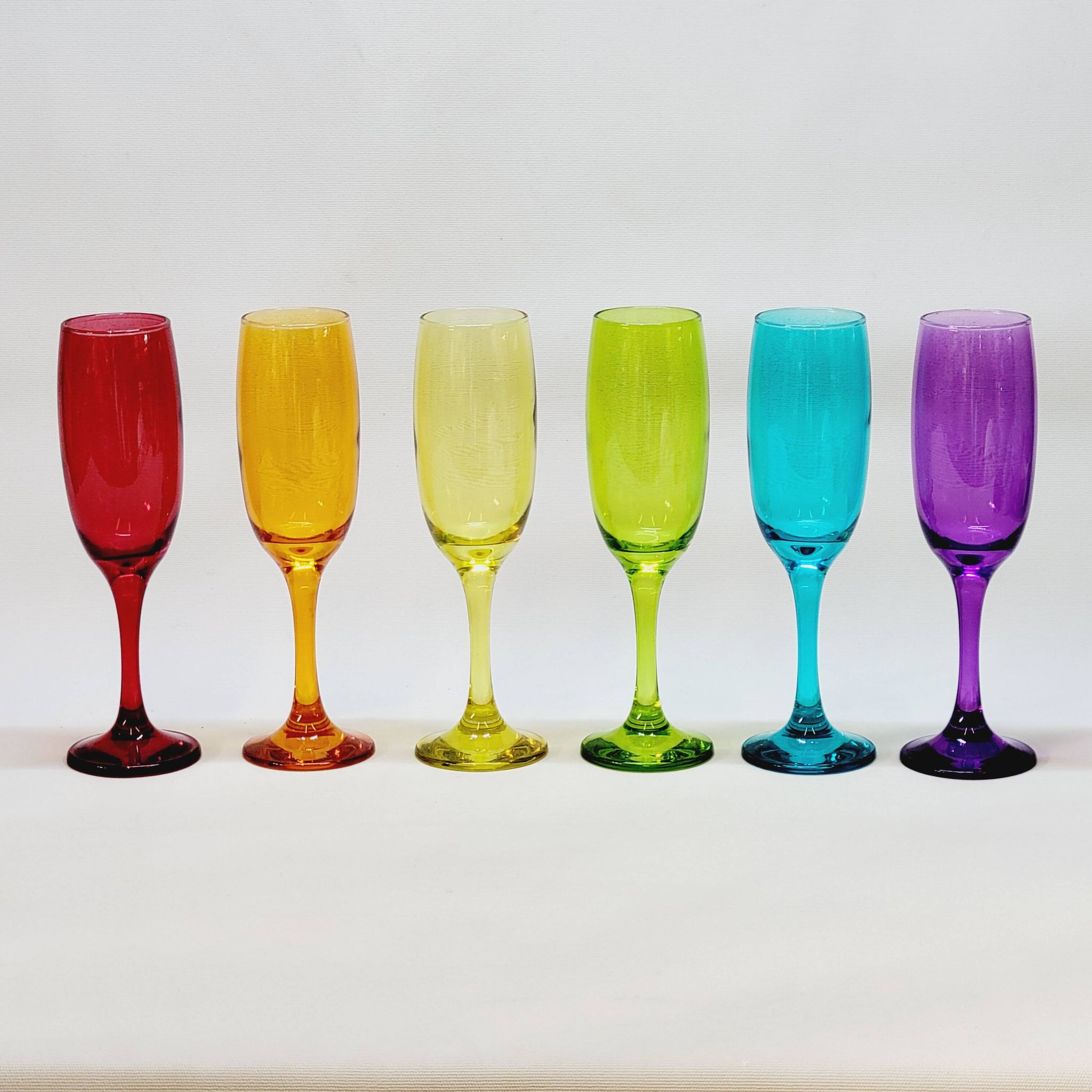 6 multicolored glass champagne flutes red orange yellow green blue purple