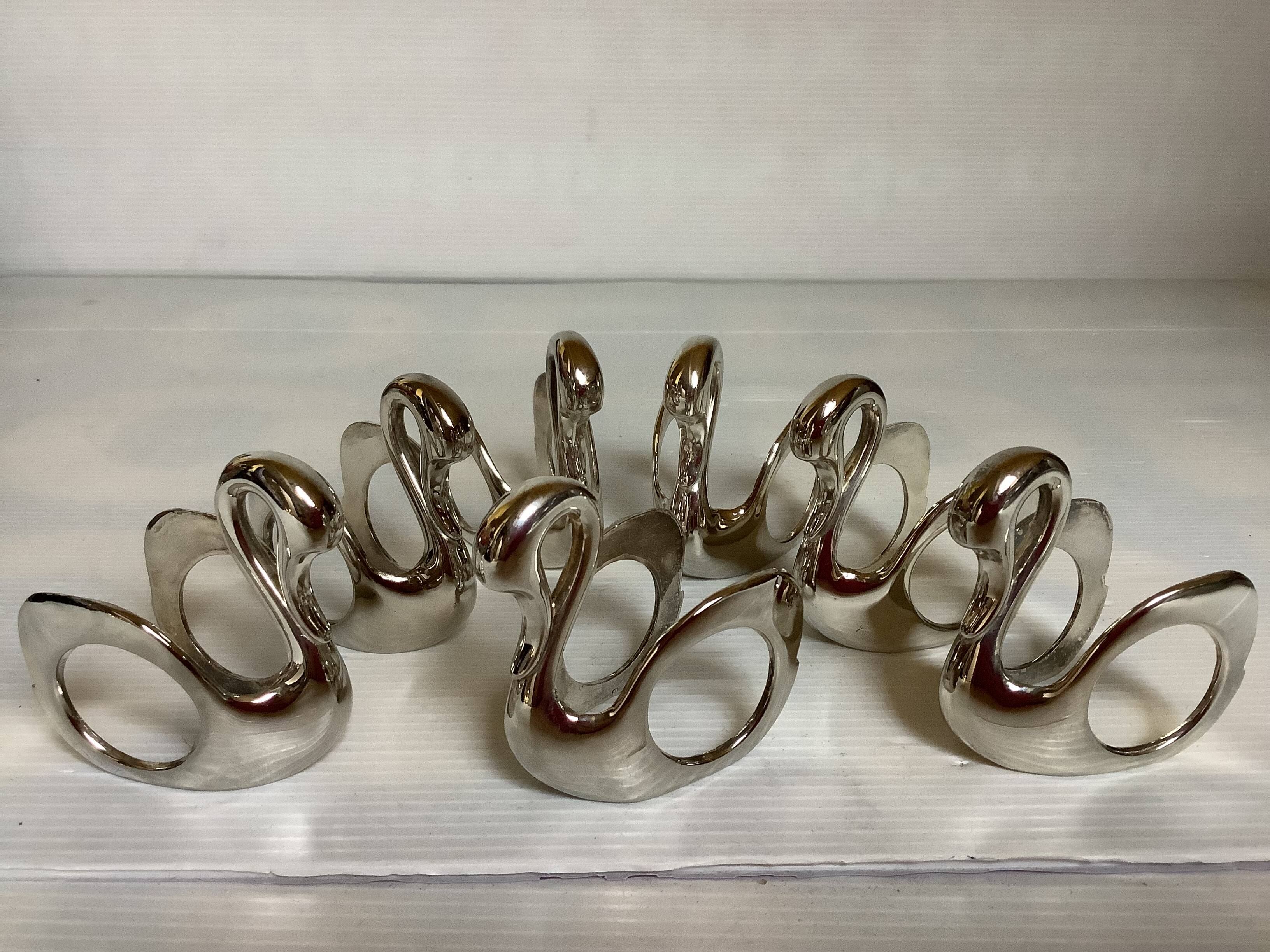 Seven silver-plated zoomorphic metal knife rests