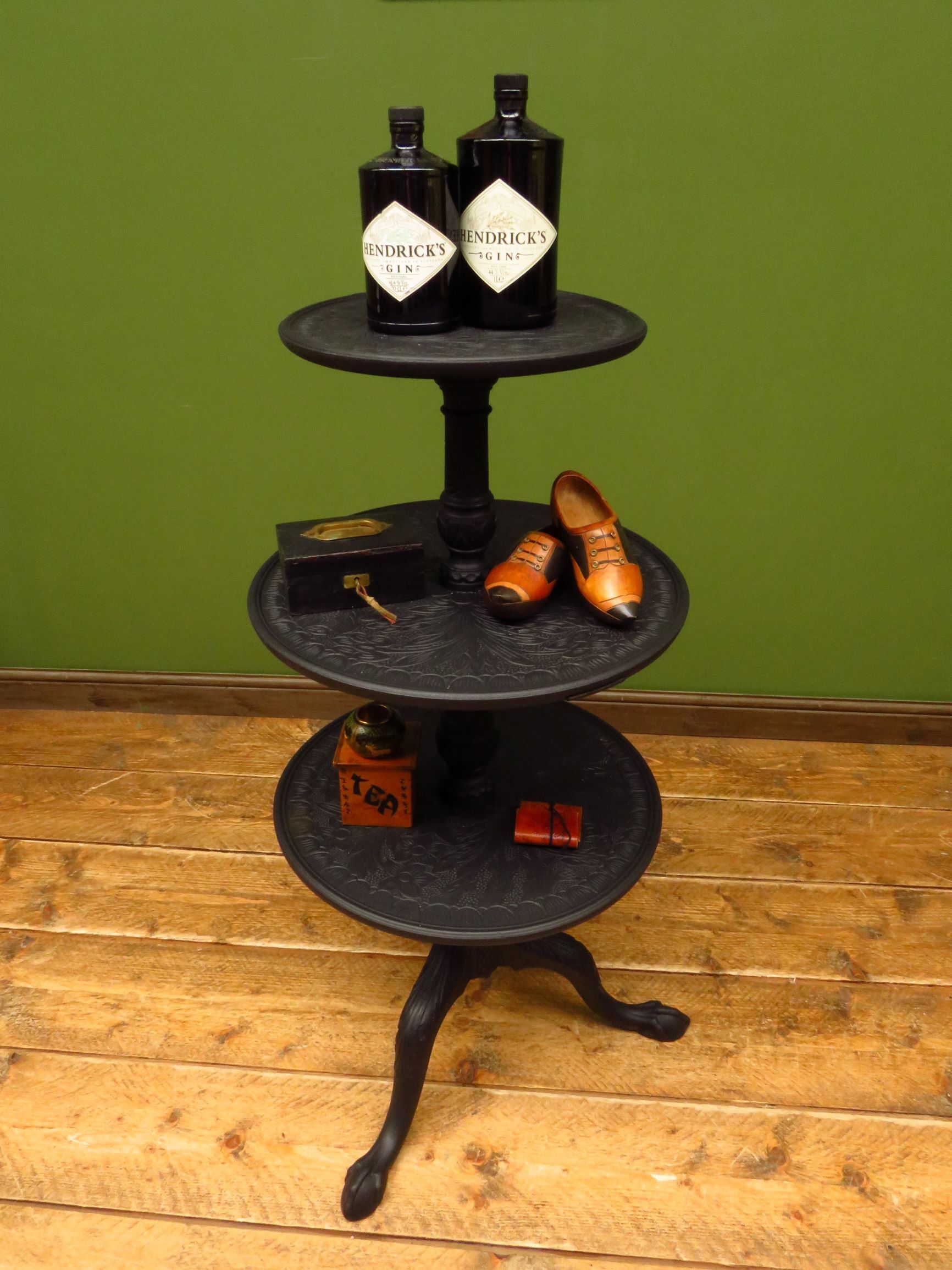 Antique black painted tiered stand