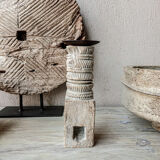 Candle holder in light carved wood
