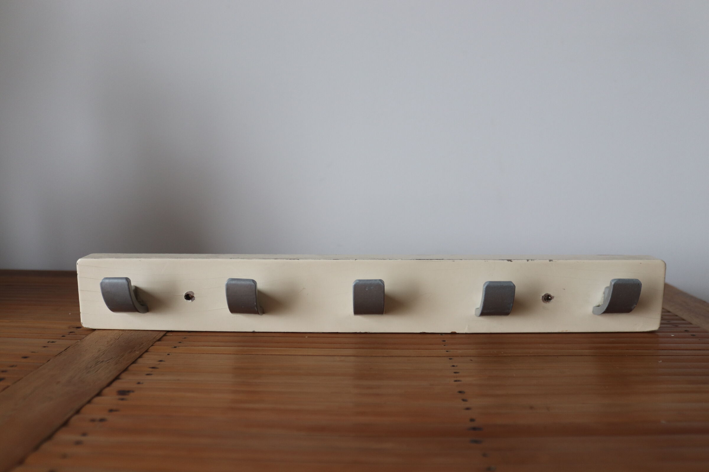 Patinated wood and metal hook