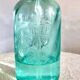 Ancien siphon en verre bleu