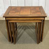 Set of 3 nesting tables in teak with tiled tops.