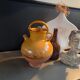 Ancient jar in glazed terracotta