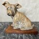 Terracotta dog signed R. Pollin
