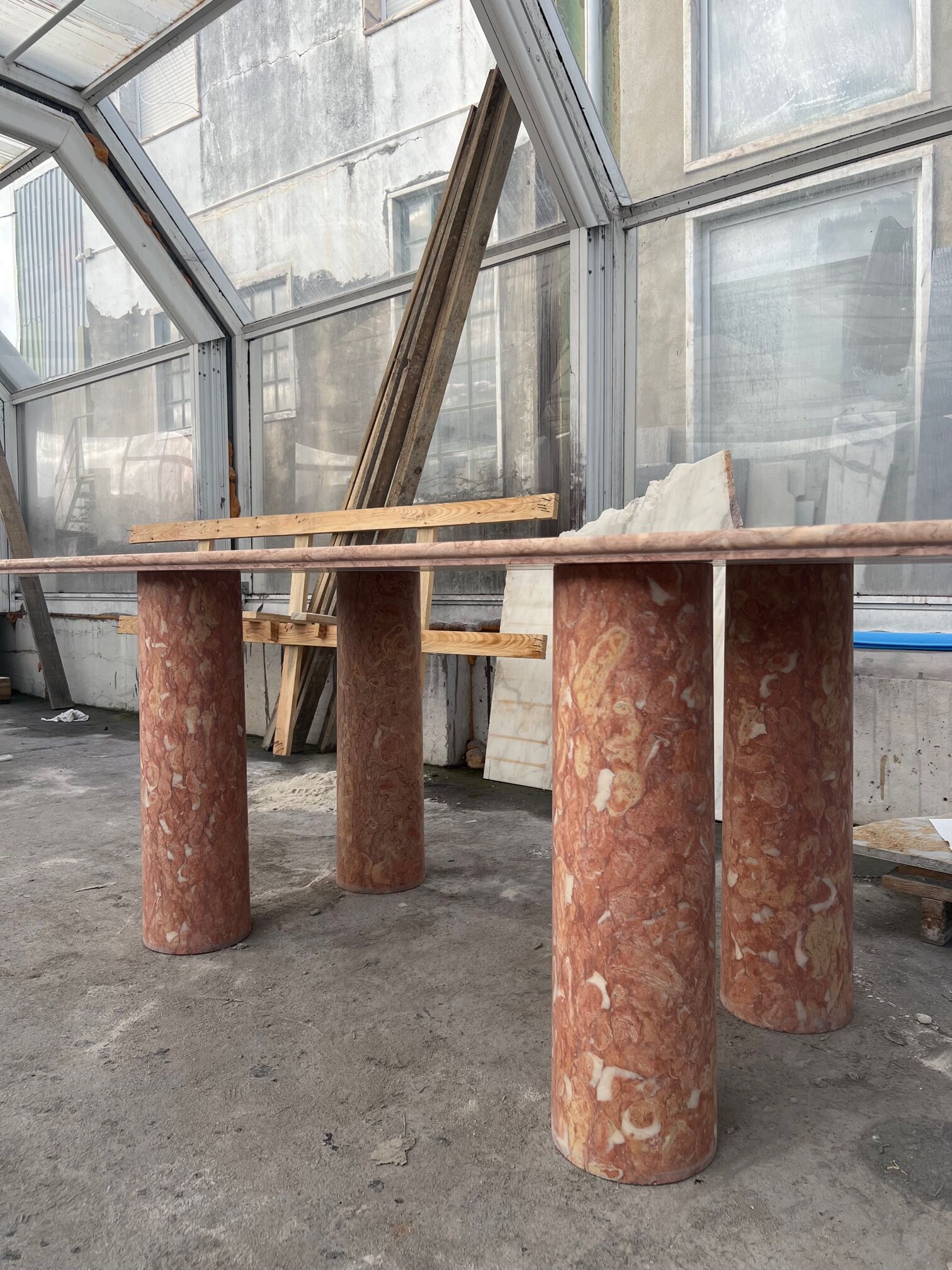 Large rectangle stone dining table in red/pink Portuguese Travertine