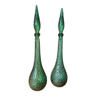 Pair of green bubbled glass bottles. With cap