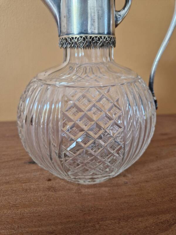 Cut crystal carafe and silver-plated metal