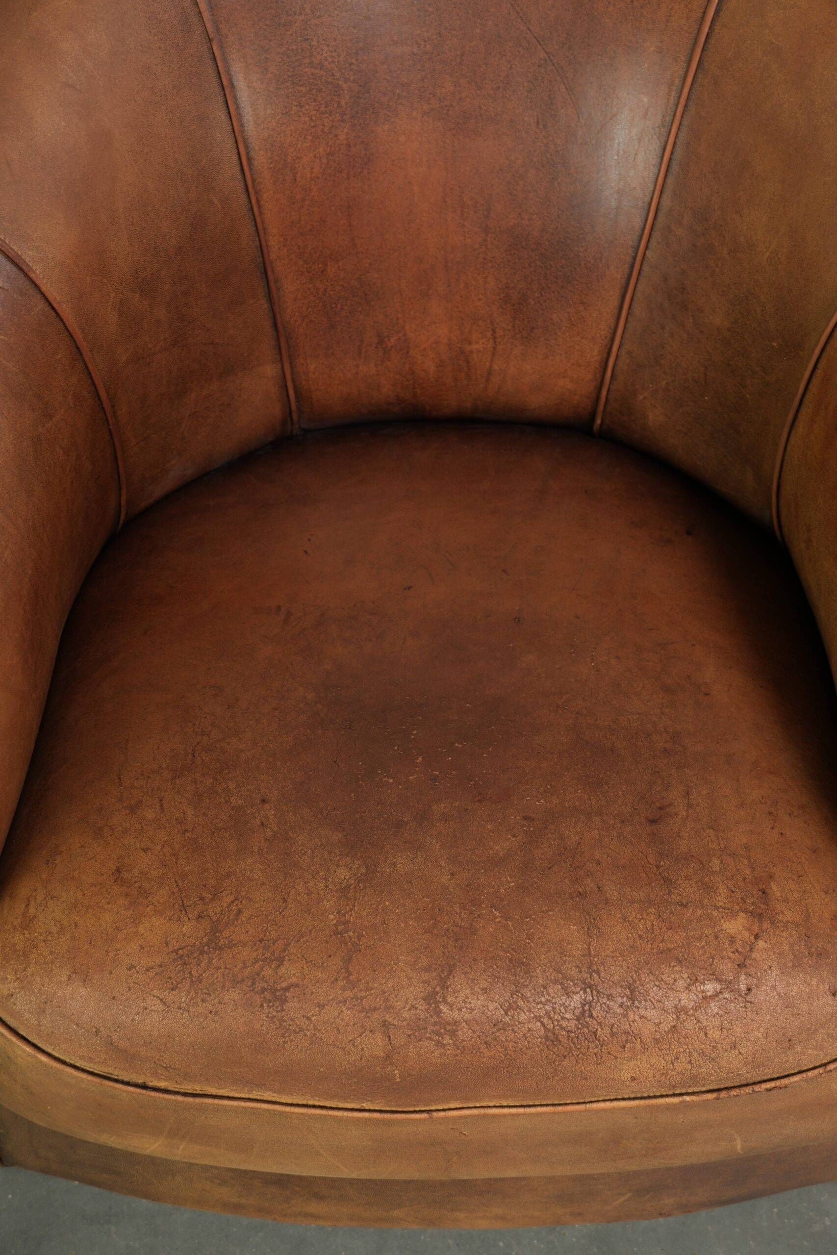 Sturdy set of vintage sheepskin club armchairs with a great appearance