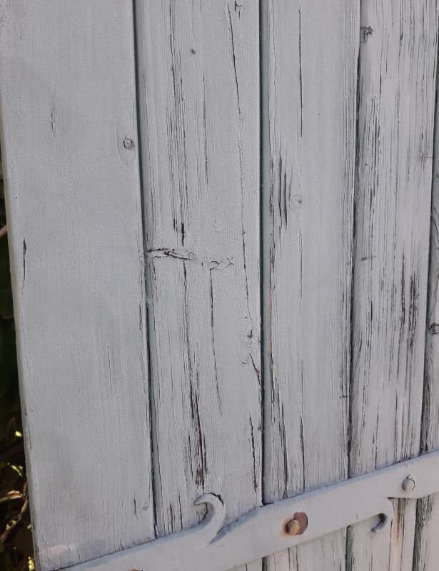 Pair of large wooden iron hanging shutters