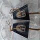 Pair of brass plastic sconces