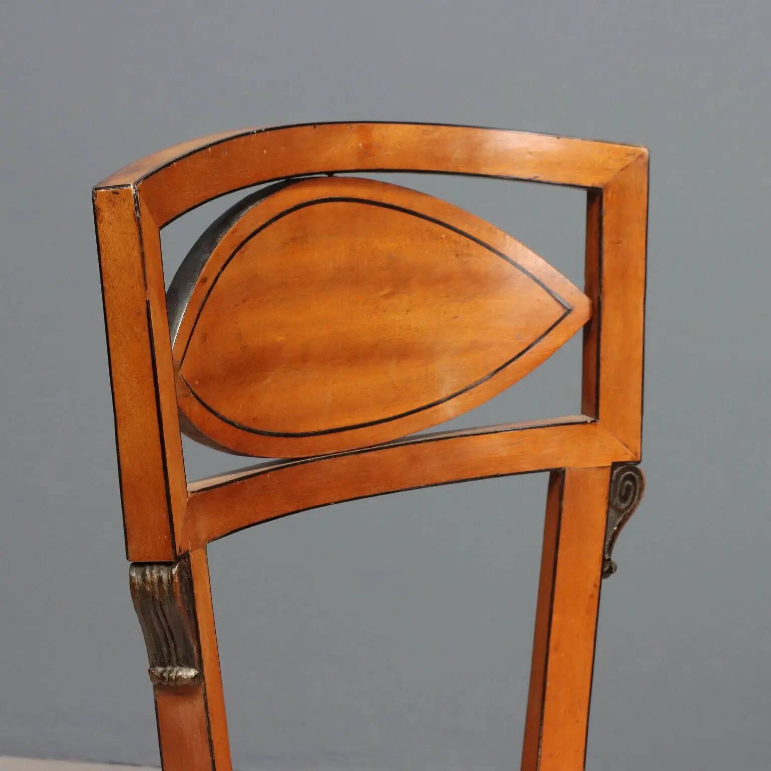 Antique Regency style chairs in mahogany and XX Century fabric.