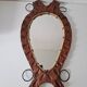 Brutalist mirror in wood and rope, free form.