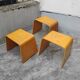 Nested tables with curved wood