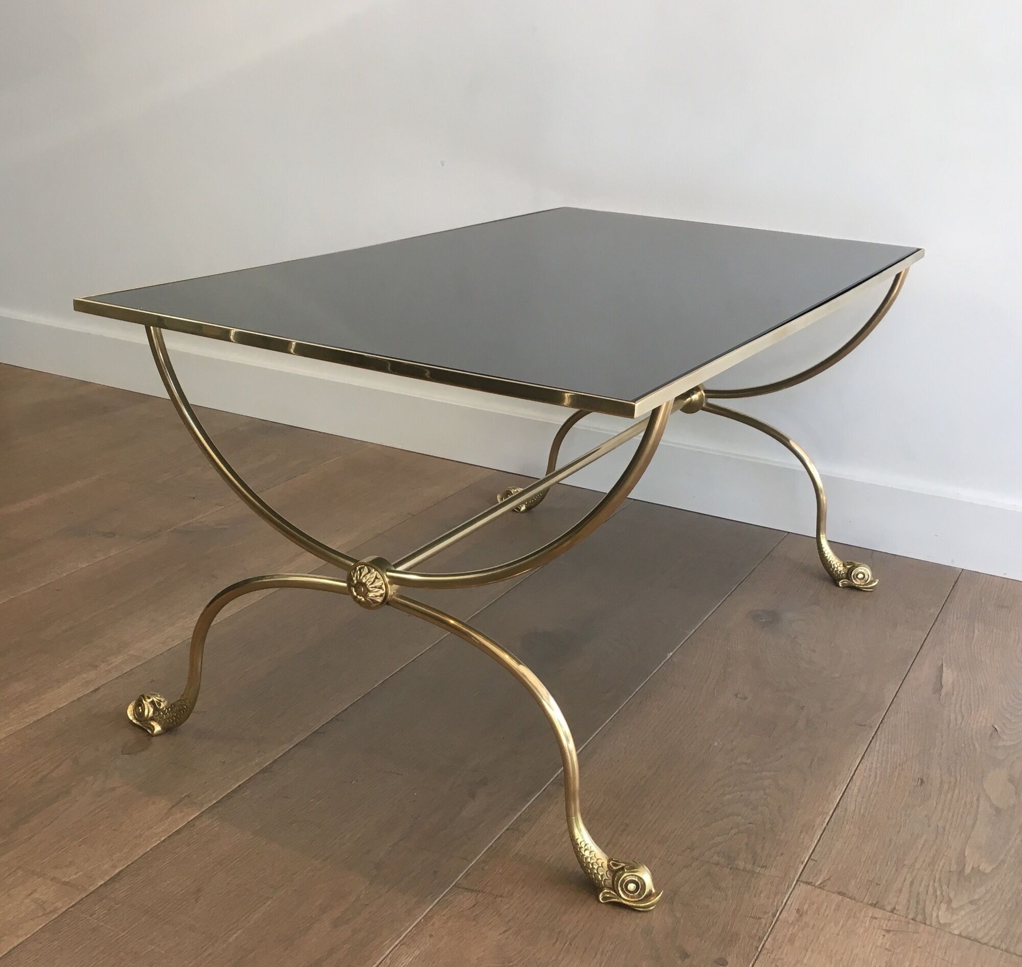 Neoclassical brass style coffee table with dolphin head decoration