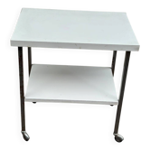 Rolling dessert trolley with 2 white formica shelves and steel, 1980.