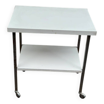 Rolling dessert trolley with 2 white formica shelves and steel, 1980.
