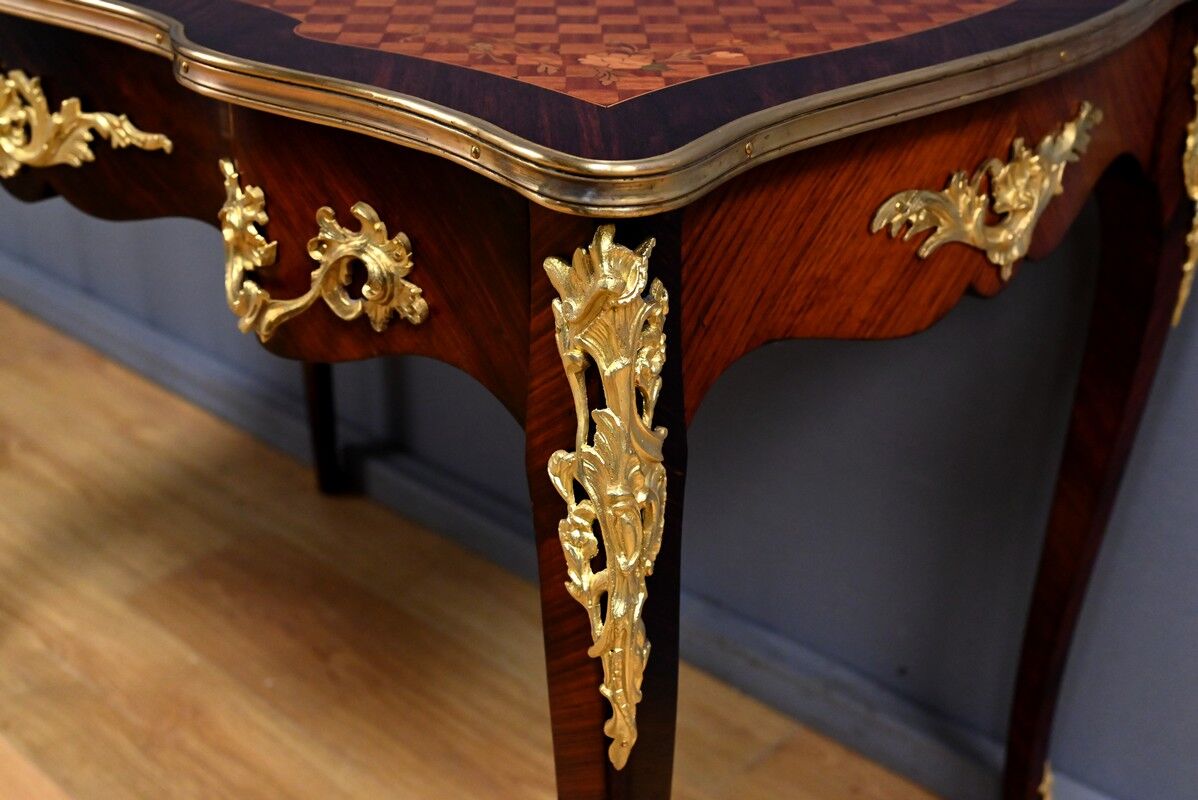 Rosewood, mahogany, and rosewood desk-table, Louis XV style – early 20th century.